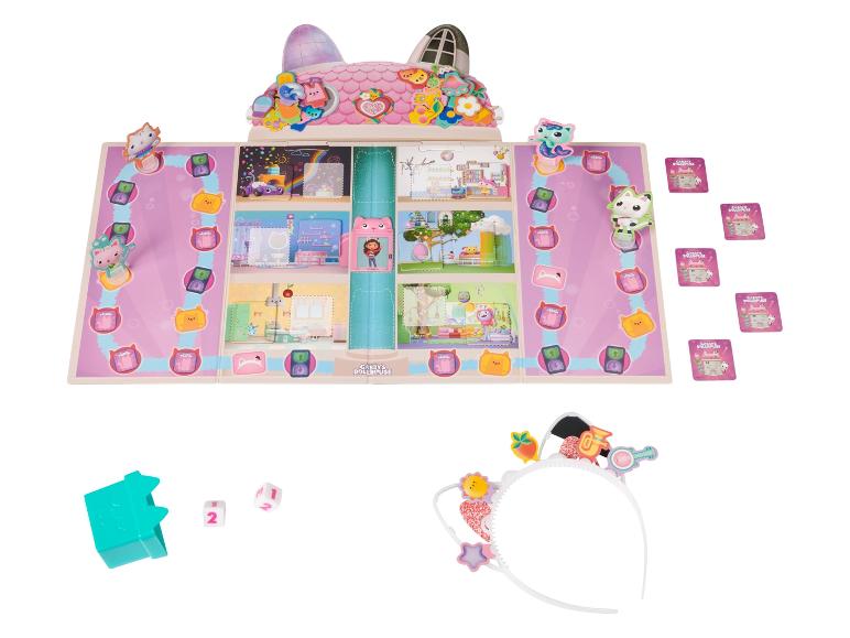 Jeu de société Gabby's Dollhouse avec figurines, dés et bandeau.