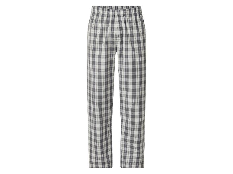 Pantalon de pyjama à carreaux gris et blanc avec taille élastique.