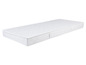 Un matelas blanc avec le dessus matelassé.