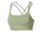 Soutien-gorge de sport vert clair avec bretelles croisées dans le dos.
