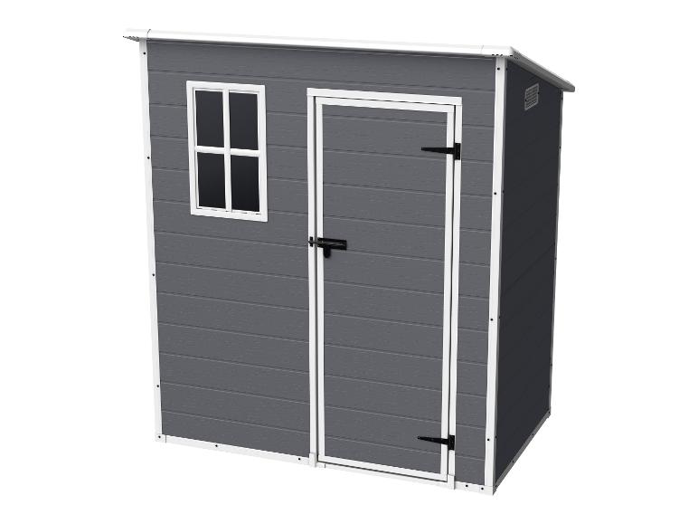Abri de jardin gris avec fenêtre et porte blanches.