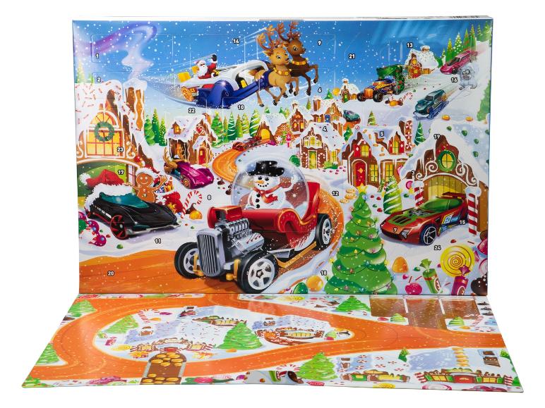 Calendrier de l'Avent Hot Wheels de Noël avec voitures et scène de village d'hiver.