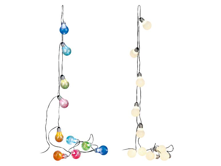 Guirlande lumineuse avec ampoules colorées et blanches.