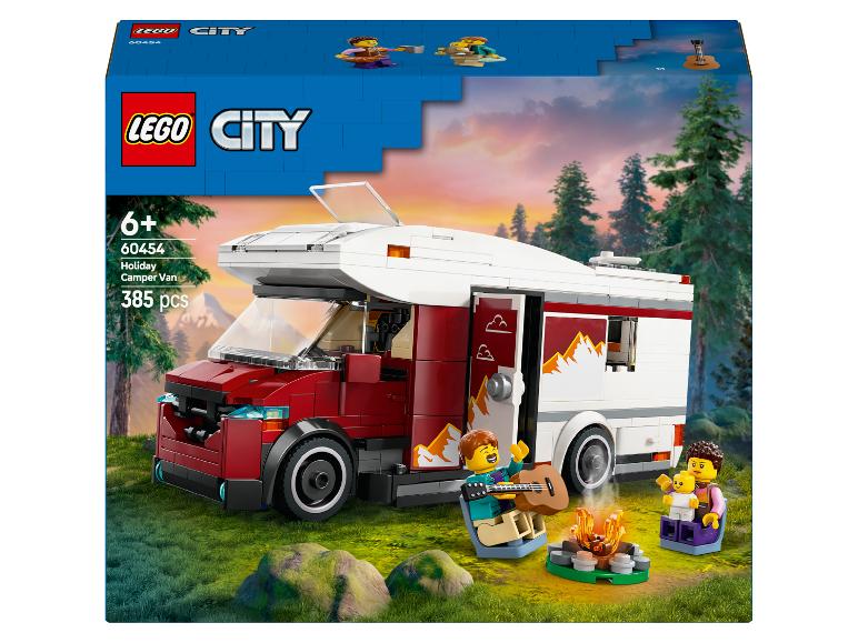 Boîte LEGO City avec un camping-car rouge et blanc, une famille et un feu de camp.