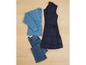Un pull bleu, un jean et une longue veste sans manches foncée