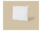 Oreiller blanc sur fond beige