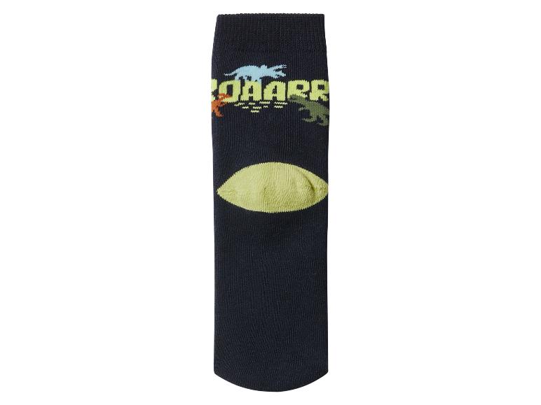 Chaussette noire avec imprimé dinosaure et texte «ROAARR»