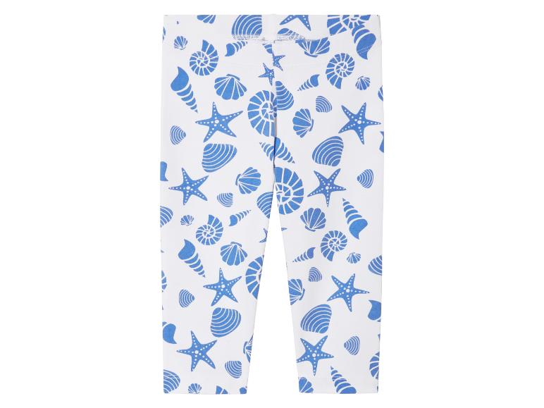 Leggings enfant à motifs marins : coquillages et étoiles de mer bleues.