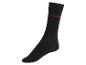 Une chaussette noire avec l'inscription 'Monday'.