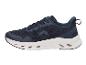 Chaussures de sport CRIVIT pour homme en bleu foncé avec semelle blanche.