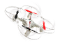 Drone quadricoptère blanc en vol sur fond noir