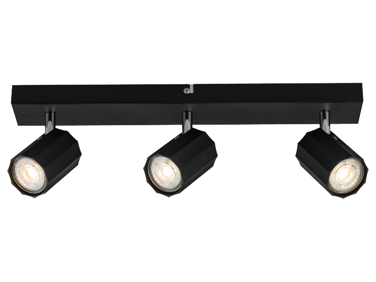 Spot sur rail noir avec trois spots LED allumés.
