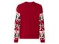 Un pull de Noël rouge avec un motif de sapin de Noël, de bonhomme en pain d'épices et de bonbons.