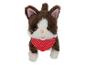 Un jouet en peluche de chat marron et blanc avec un bandana rouge à pois blancs.