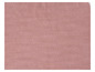 Gros plan sur un tissu rose tricoté.