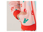 Un sweat-shirt rose pour enfant avec une fermeture éclair rouge et des lettres
