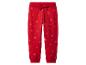 Pantalon de jogging rouge pour enfant avec imprimé flocons de neige et cordon de serrage.