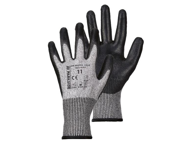Gants de travail noirs de Parkside avec une couche protectrice grise.