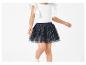 Haut blanc à volants et jupe tulle noire à pois scintillants pour enfant.