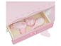 Accessoires de coiffure en bois rose : sèche-cheveux, brosse et boîte.