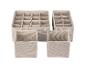 Boîtes de rangement beige à compartiments multiples pour tiroirs.