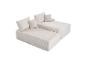 Canapé modulaire beige en deux pièces avec coussins, texture velours côtelé.