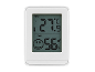 Thermomètre et hygromètre numérique blanc avec écran LCD, affichant 27.9°C et 56% d'humidité.
