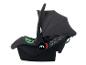 Siège auto bébé noir et gris avec poignée de transport et pare-soleil, accent vert.