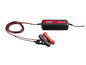 Un chargeur de batterie Ultimate Speed avec des pinces noires.