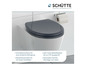 Une lunette de WC Schütte gris foncé avec fermeture douce.