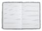Carnet à lignes, couverture en fausse fourrure grise.