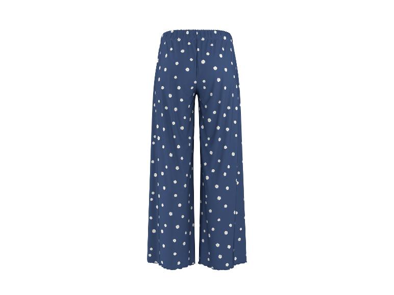 Pantalon bleu à motifs marguerites blanches
