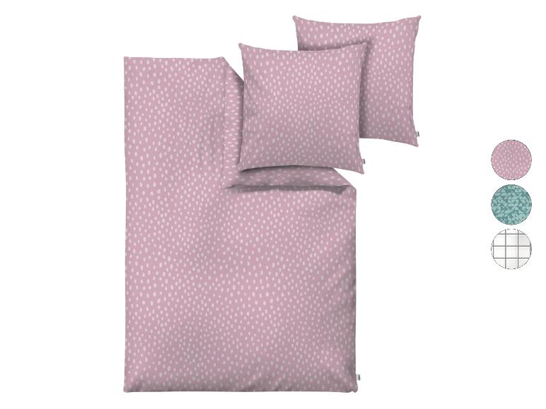 Parure de lit rose à pois blancs avec deux oreillers, trois options de couleur affichées à droite.