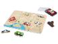 Puzzle en bois avec des véhicules: bus, hélicoptère, ambulance, camion de pompiers, avion et bateau.