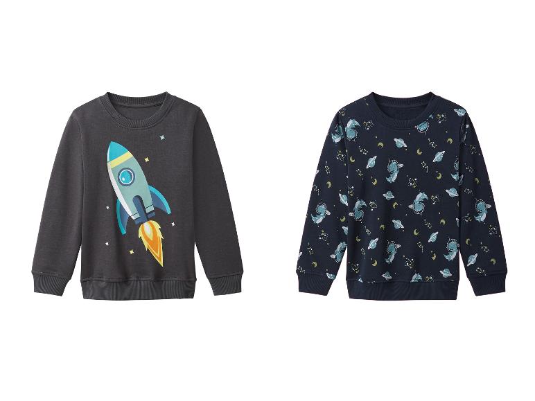 Deux pulls pour enfants sur le thème de l'espace.