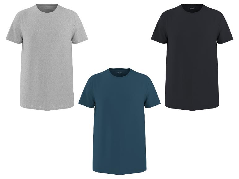 Trois t-shirts unis en gris, bleu foncé et noir.