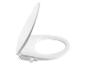 Une lunette de toilette blanche avec un bidet intégré.
