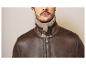 Blouson en cuir marron avec col en fourrure