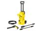Un nettoyeur haute pression Karcher jaune avec des accessoires.