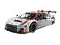 Une voiture de course Audi Sport blanche, fabriquée avec des briques Lego.
