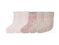 Cinq paires de chaussettes côtelées aux tons pastel rose et beige.