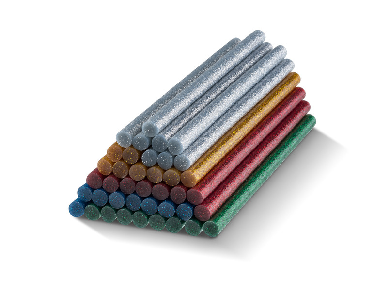 Bâtonnets de colle pailletés de différentes couleurs.
