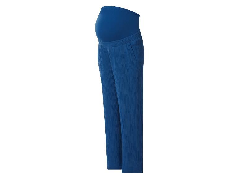 Pantalon de maternité bleu taille haute à texture froissée.