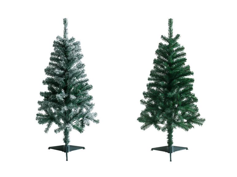 Deux sapins de Noël artificiels, un floqué et un vert, sur fond blanc.