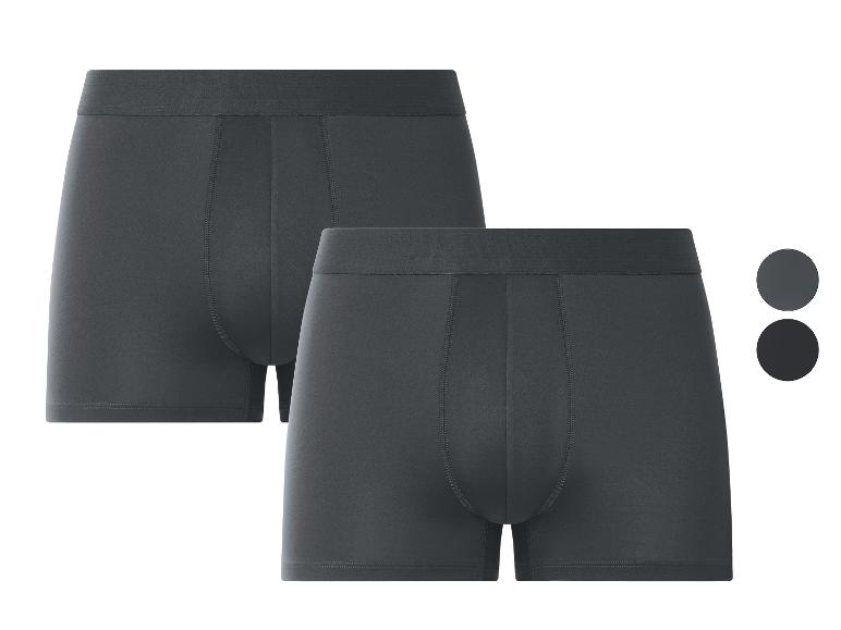 Deux boxers pour hommes en gris foncé et noir.