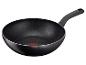 Poêle Tefal noire : wok idéal pour la cuisine asiatique.