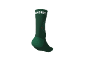 Chaussette verte avec motif de sapin en outils et texte blanc sur le bord