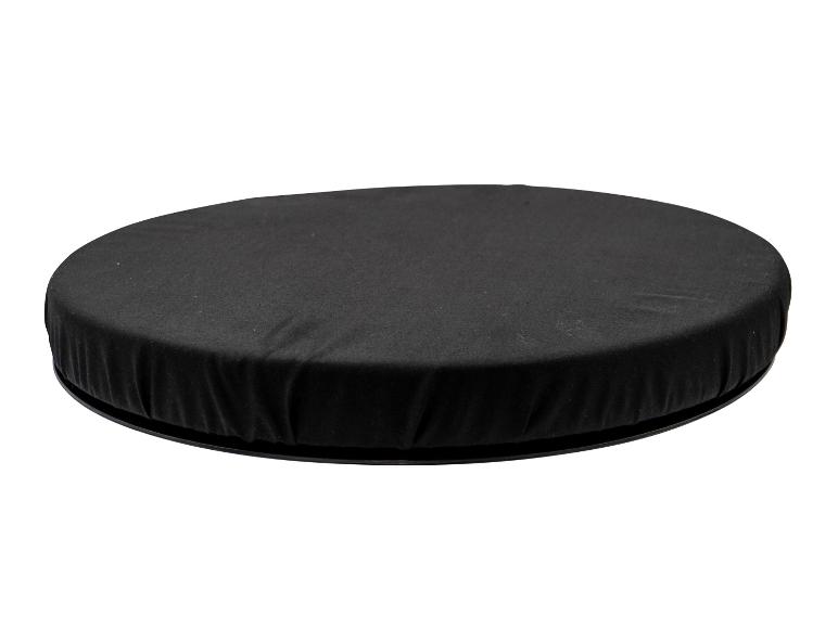 Coussin rond noir avec une housse en tissu, vu d'un angle légèrement élevé.