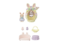 Ensemble de jeu de Pâques avec figurine de lapin, maison en forme d'œuf et accessoires.