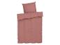 Parure de draps couleur terre cuite.